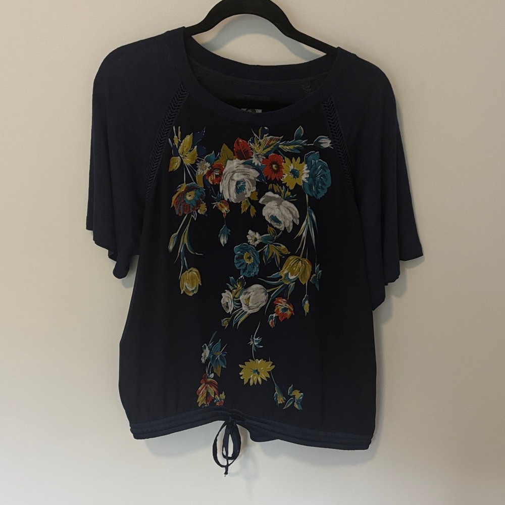 Anthropologie Navy short sleeve Top with Floral design on front